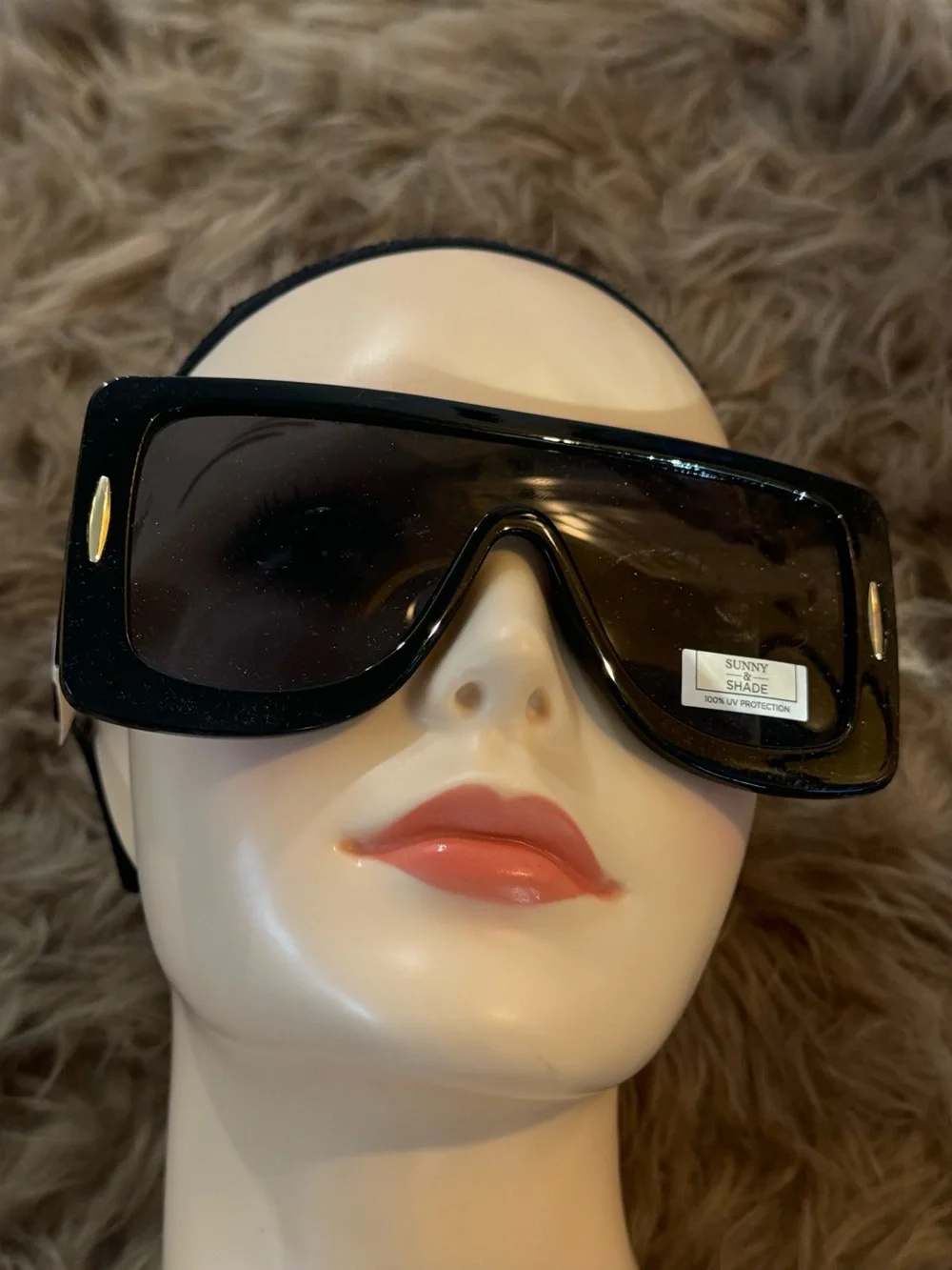 Futuristic sunglasses with gold details